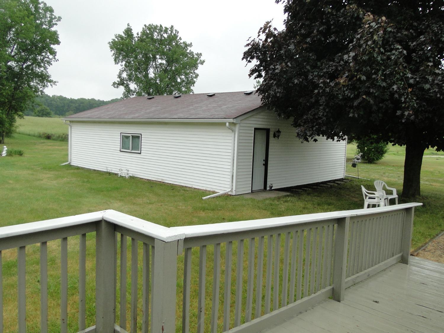 612 West 100 South Hebron, IN 46341 - Photo 14 of 18 a view of a house with a yard