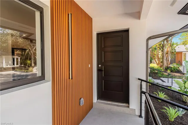 view of hall way with mirror