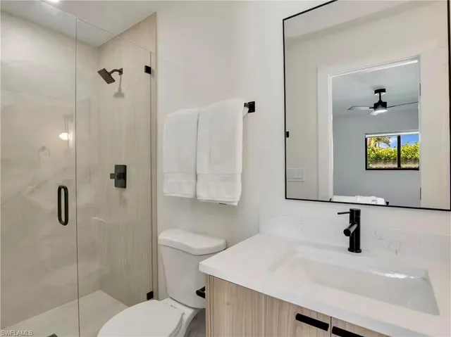 a view of an chairs and table in the balcony