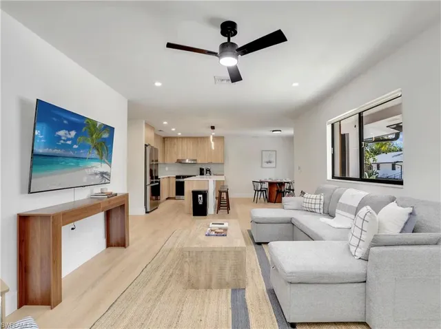 a kitchen with a table and chairs in it