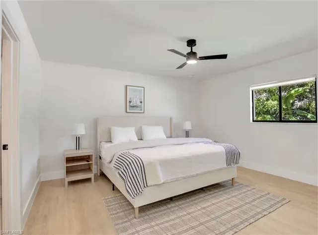 a room with furniture and a window