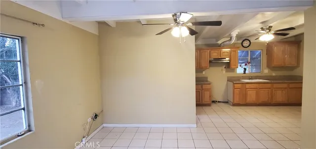 a view of a kitchen with a sink