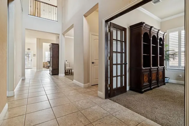 a view of a hallway with a window