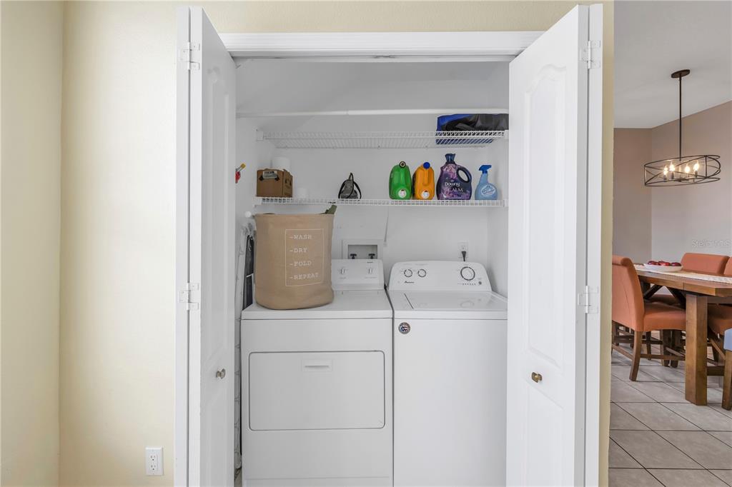 1050 Starkey Road, Unit 2201 Largo, FL 33771 - Photo 32 of 68 a utility room with dryer and washer