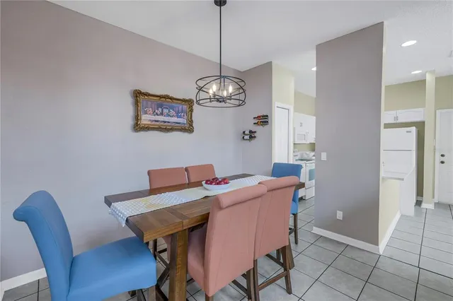 a white toilet sitting next to a shower curtain