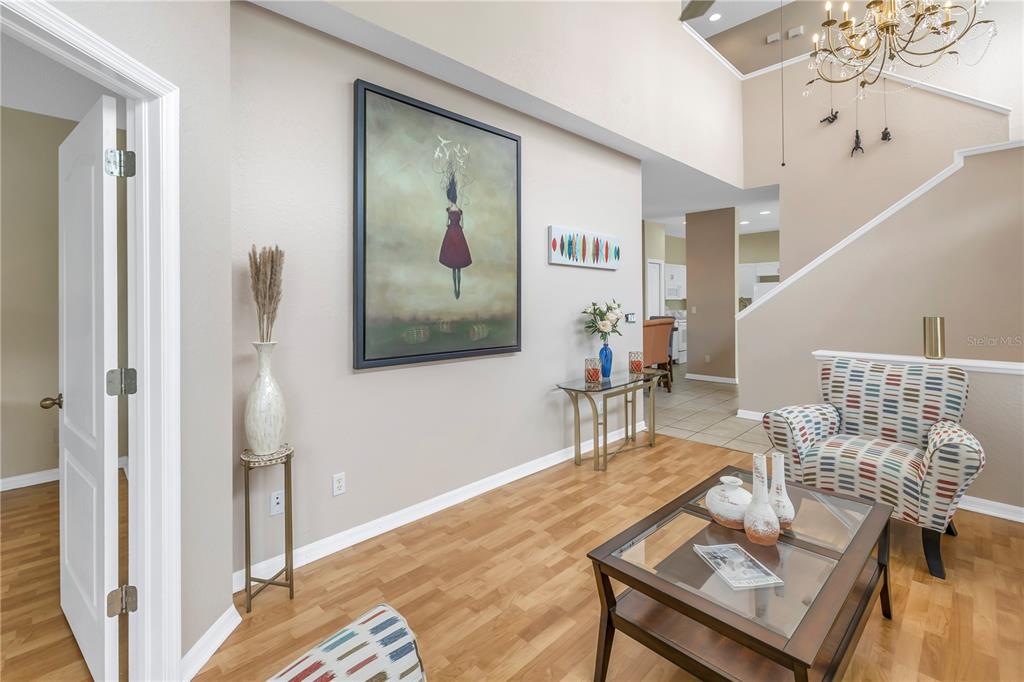 1050 Starkey Road, Unit 2201 Largo, FL 33771 - Photo 48 of 68 a living room with furniture and a painting