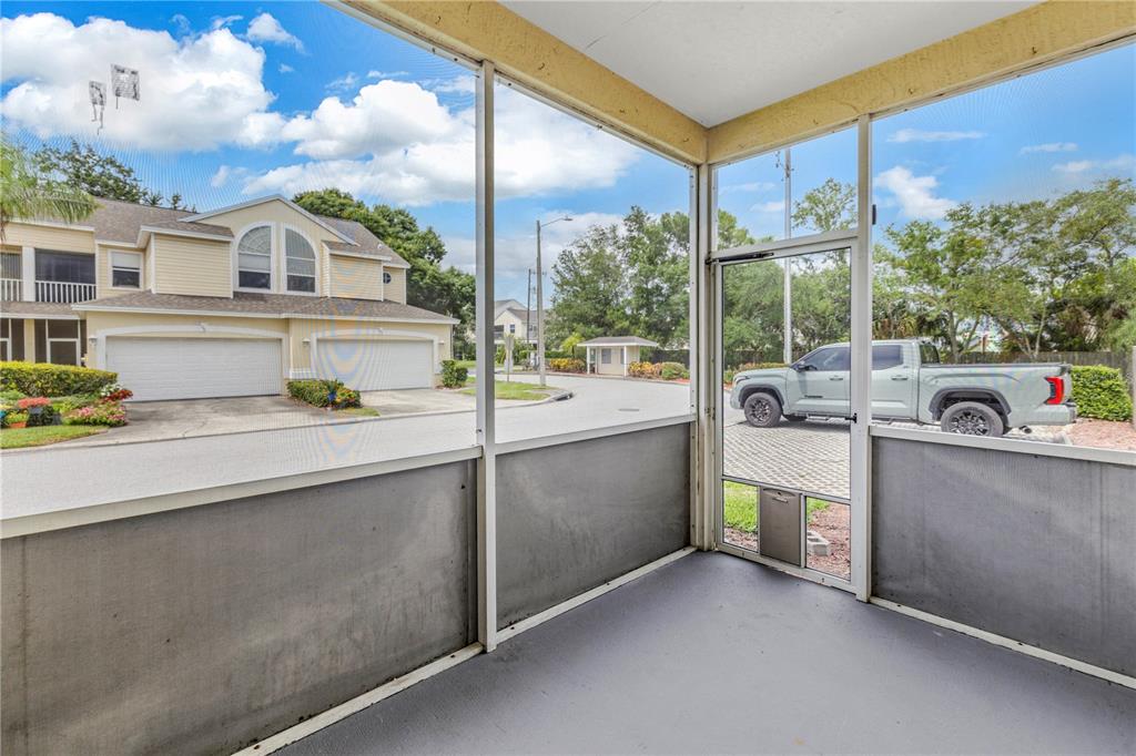 1050 Starkey Road, Unit 2201 Largo, FL 33771 - Photo 50 of 68 a view of a sink and a back yard of a house