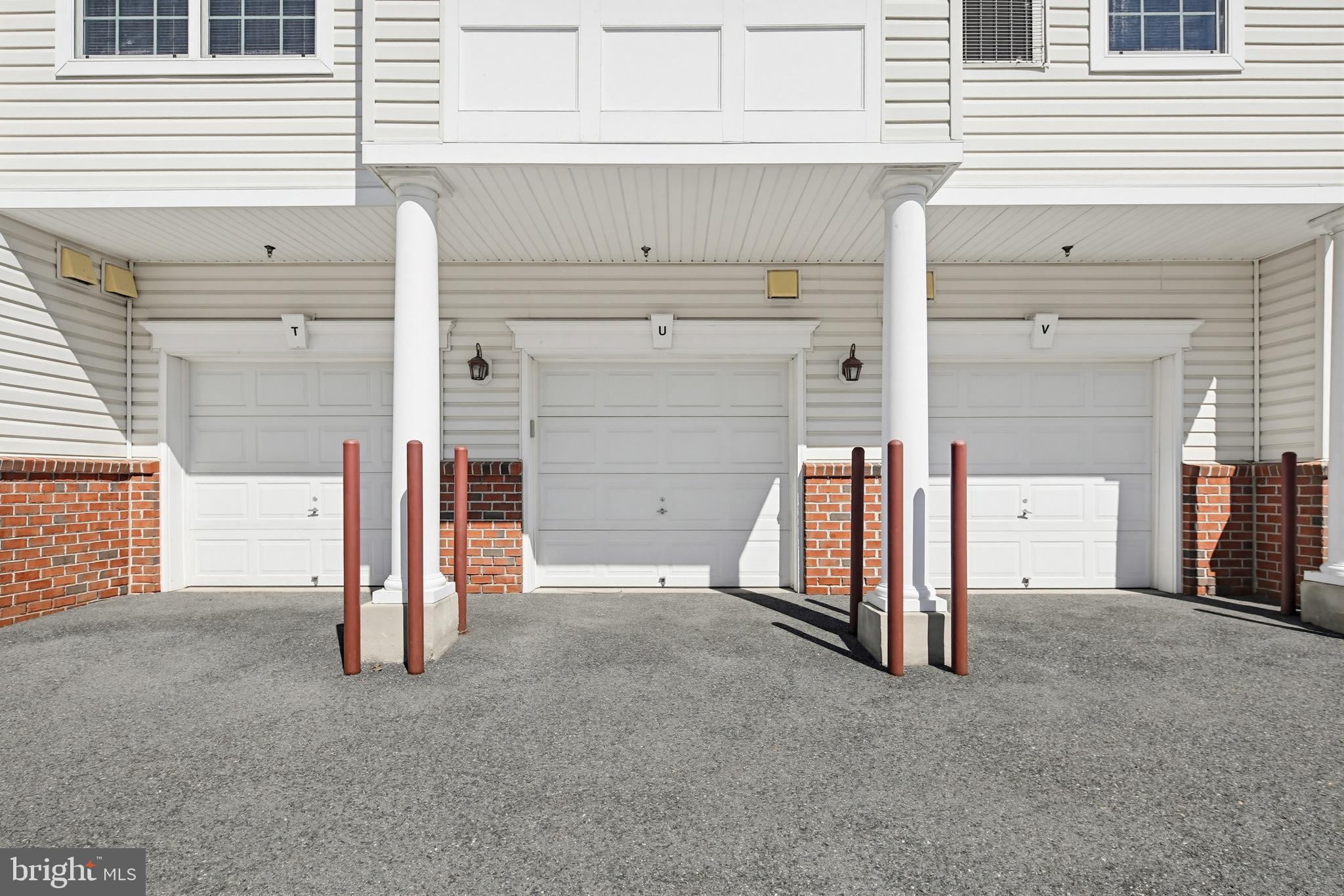 8901 Brauerton Road, Unit 301 Ellicott City, MD 21043 - Photo 13 of 49 Garage Exterior / Parking Area