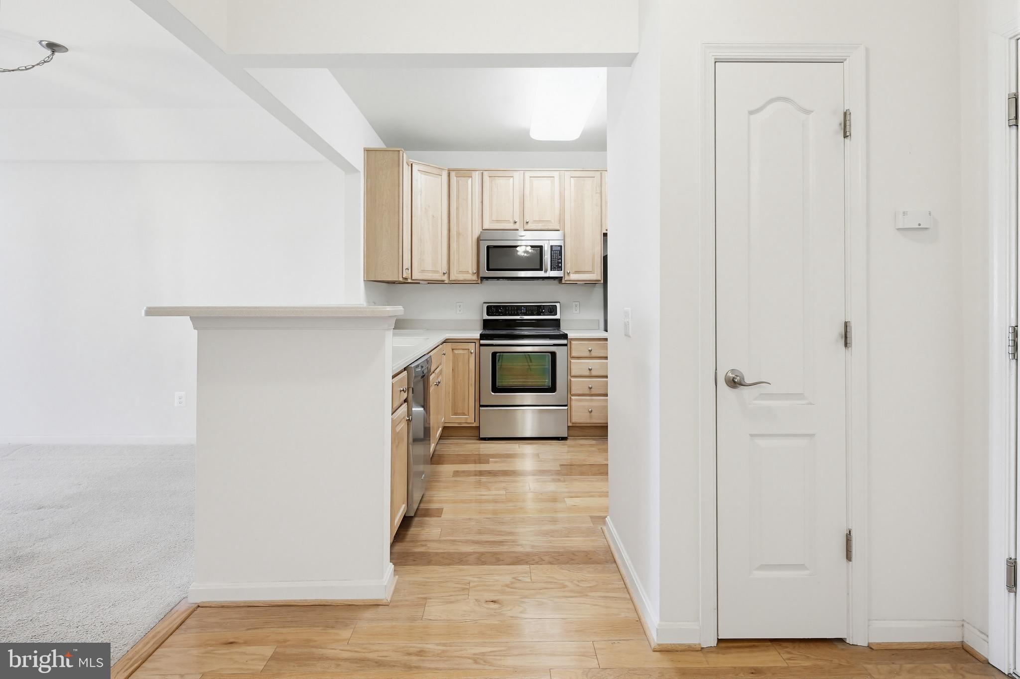 8901 Brauerton Road, Unit 301 Ellicott City, MD 21043 - Photo 17 of 49 Entry / Kitchen