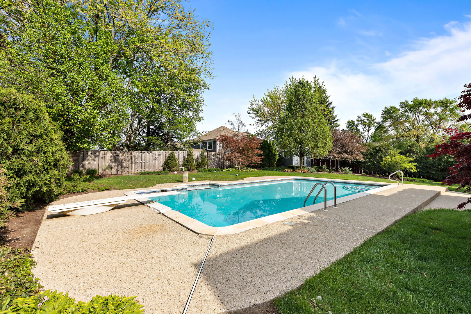 N543 Herrick Drive Wheaton, IL 60187 - Photo 32 of 37 a view of a swimming pool with a yard