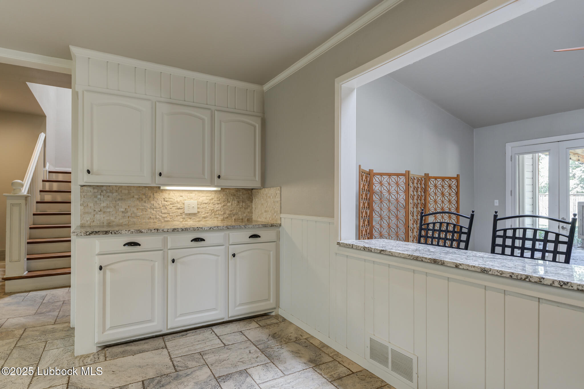 4608 18th Street Lubbock, TX 79416 - Photo 27 of 84 a kitchen with white cabinets and sink