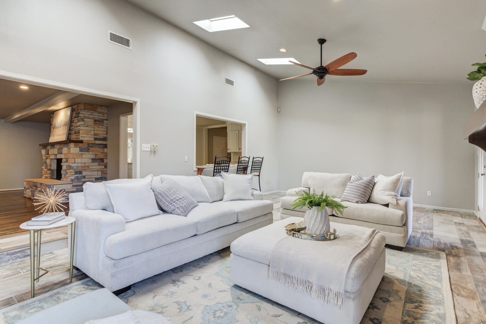 4608 18th Street Lubbock, TX 79416 - Photo 42 of 84 a living room with furniture and a large window