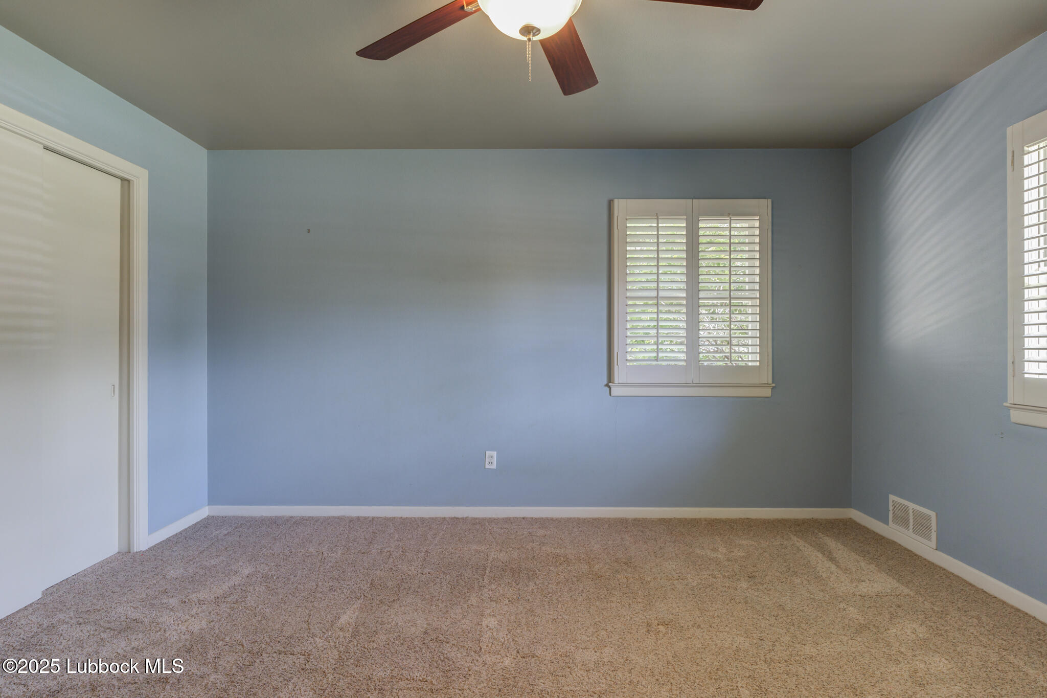 4608 18th Street Lubbock, TX 79416 - Photo 70 of 84 an empty room with a window