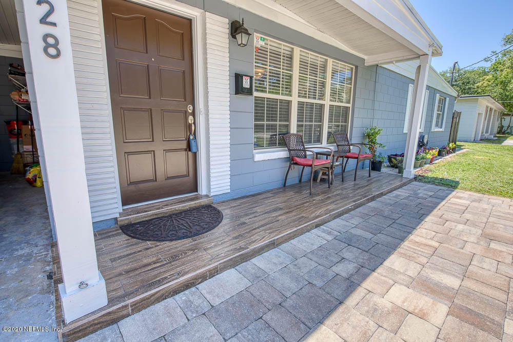 5128 Spring Glen Road Jacksonville, FL 32207 - Photo 3 of 24 a view of a two chairs in the patio