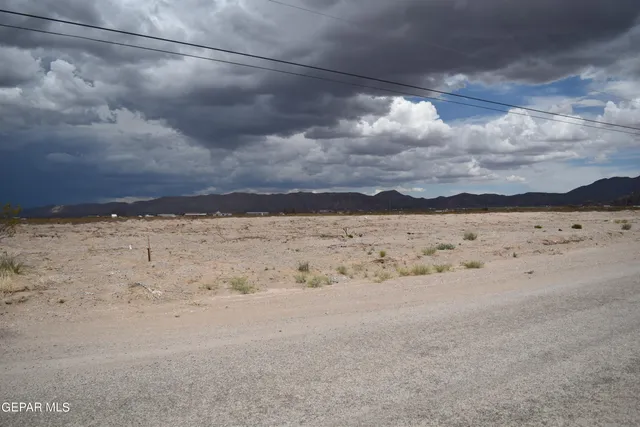 a view of a lake with a mountain in the background