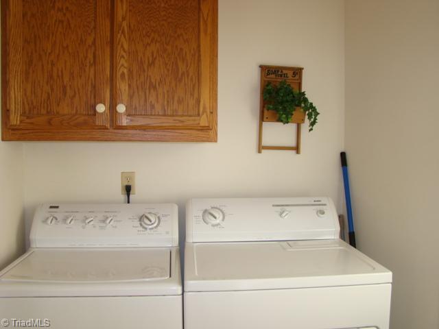 3322 Gallimore Dairy Road Denton, NC 27239 - Photo 8 of 16 Laundry Room. Cabinet Storage. Washer & Dryer Remain
