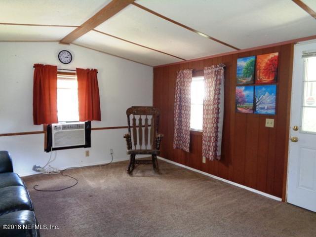 218 Violet Avenue Interlachen, FL 32148 - Photo 3 of 12 living room 2