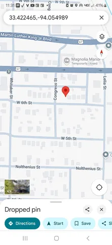 a black and white photo of a living room