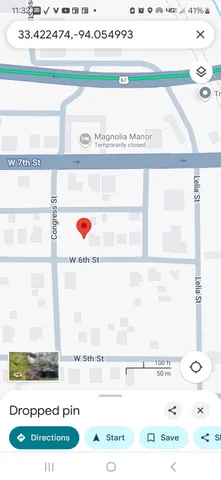 a picture of a room with a bench in it