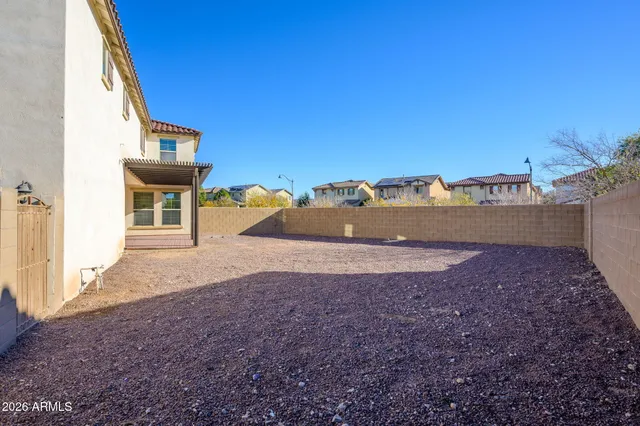 a view of a backyard of a house
