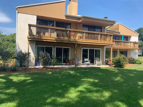 a front view of a house with swimming pool
