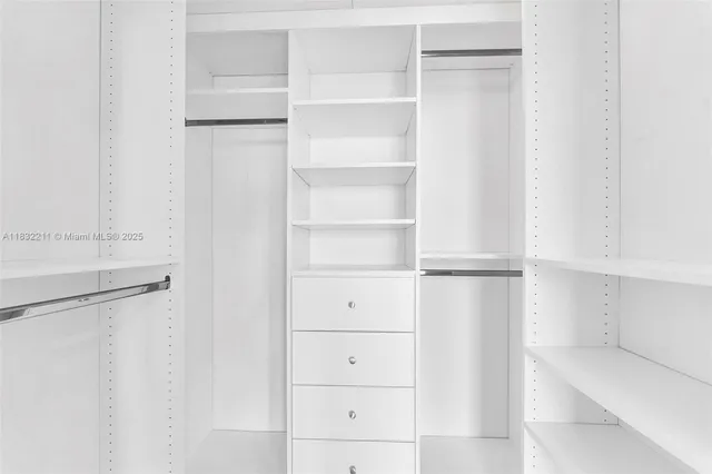 a sink a mirror and a shower