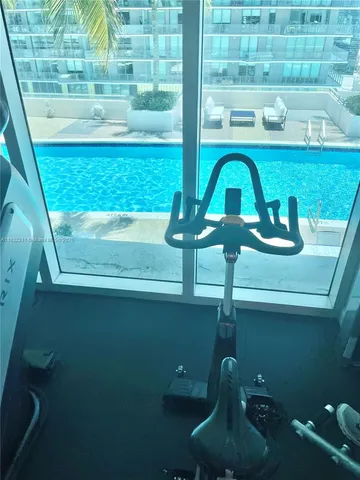 a bathroom with a tub and a shower