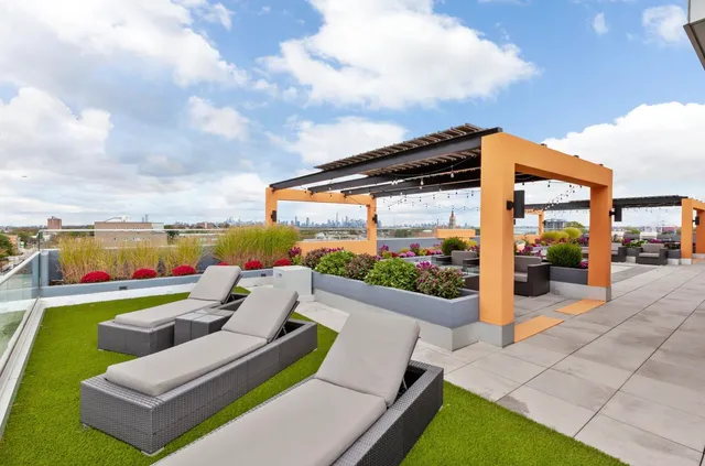 a view of swimming pool with furniture