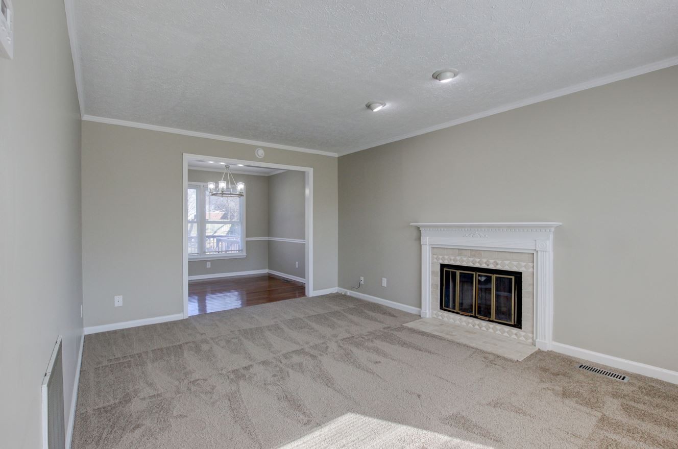 1105 Bark Ridge Circle Hopkinsville, KY 42240 - Photo 14 of 29 a view of empty room with a fireplace