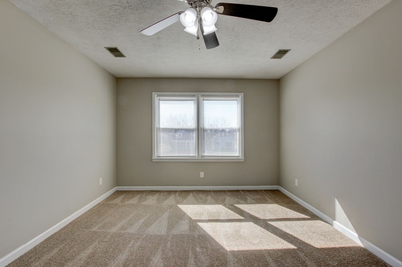1105 Bark Ridge Circle Hopkinsville, KY 42240 - Photo 7 of 29 a view of an empty room with a window