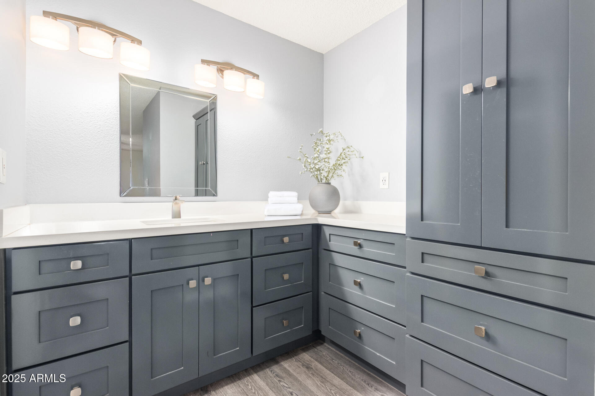 716 South Privet Way Mesa, AZ 85208 - Photo 18 of 40 a bathroom with a sink vanity and mirror