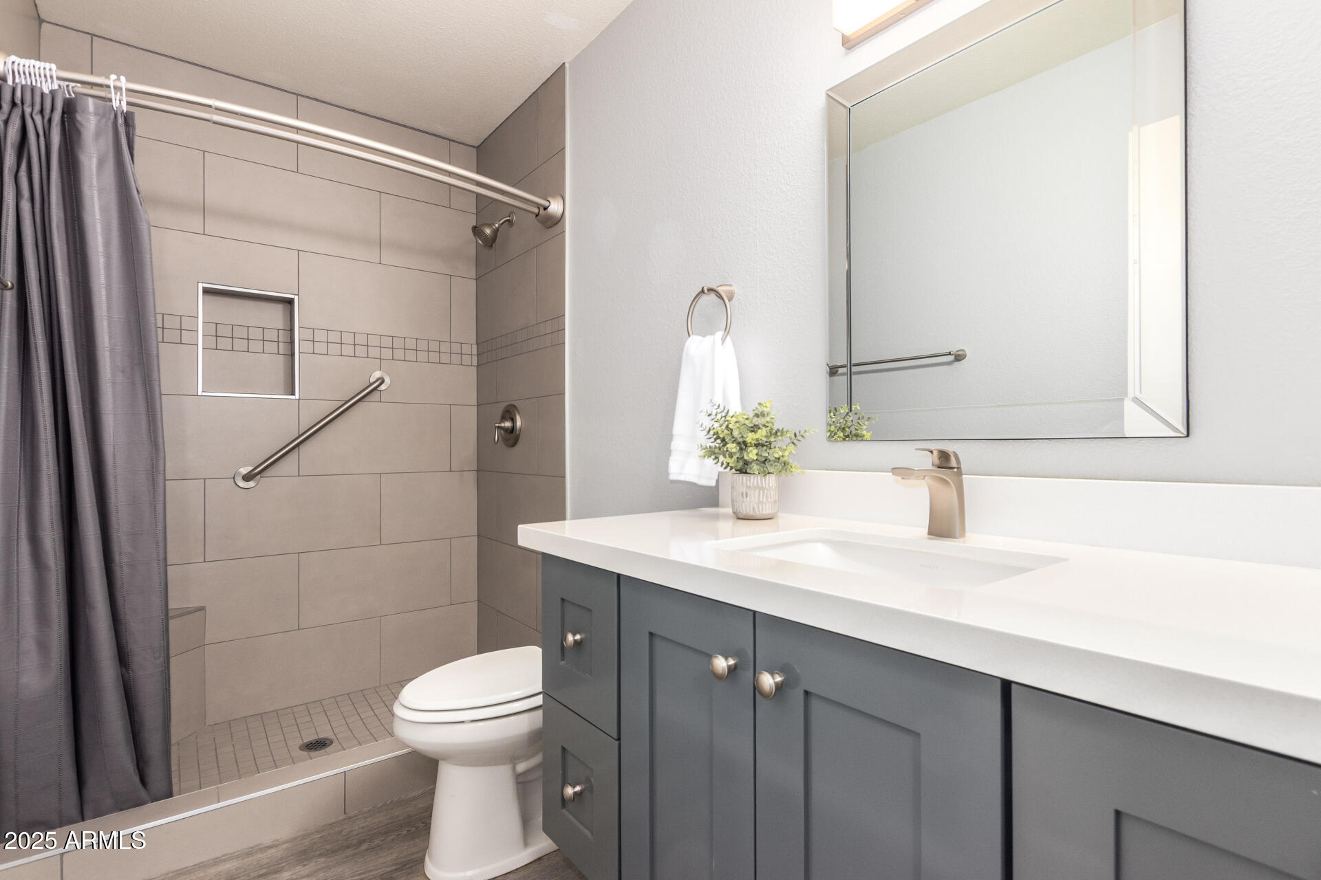 716 South Privet Way Mesa, AZ 85208 - Photo 25 of 40 a bathroom with a sink a toilet and shower