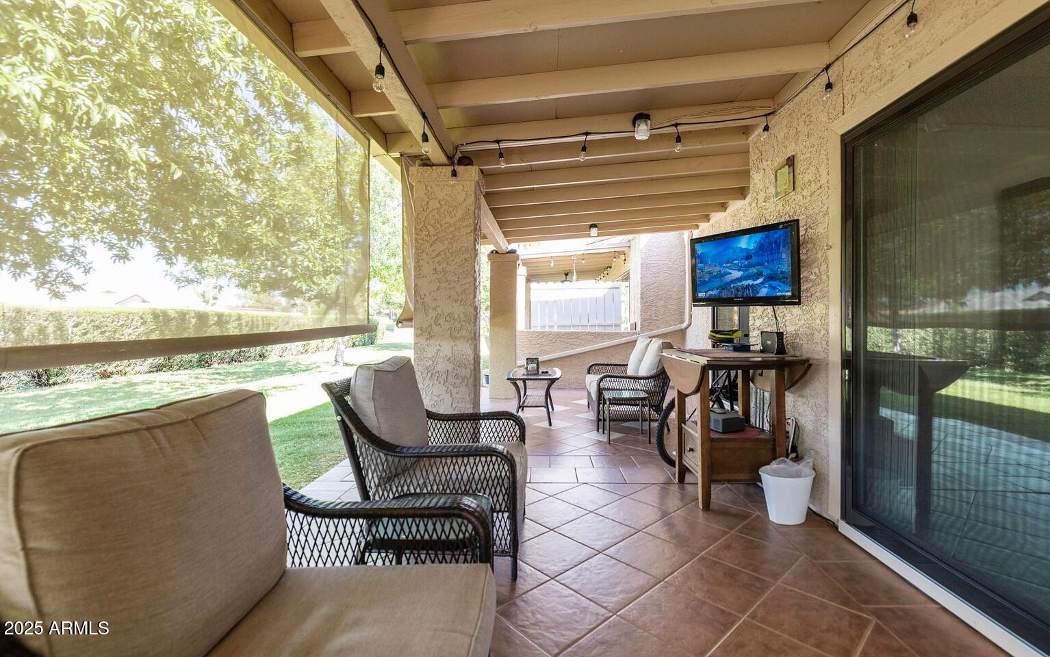 716 South Privet Way Mesa, AZ 85208 - Photo 34 of 40 a building outdoor space with patio furniture and potted plants