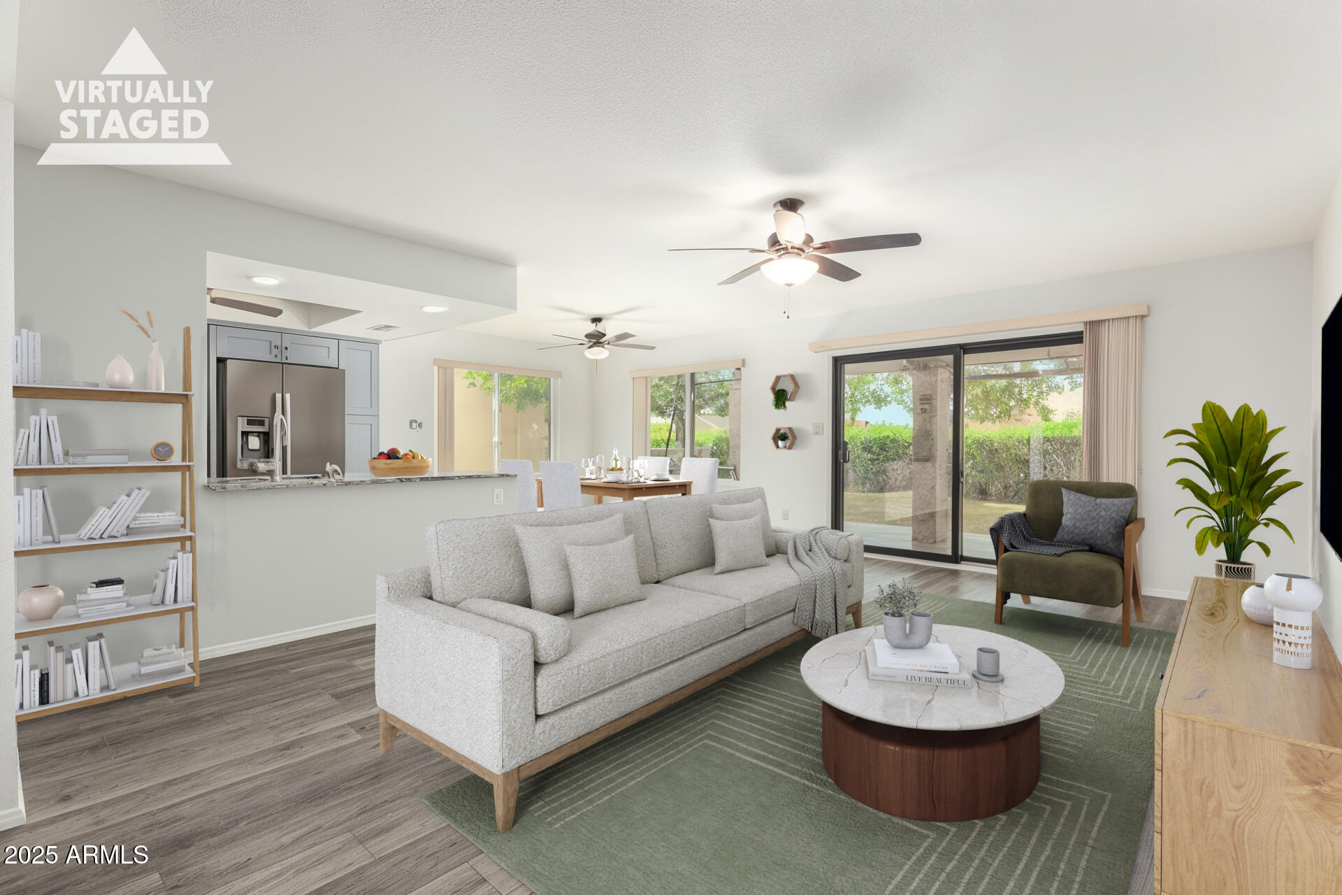 716 South Privet Way Mesa, AZ 85208 - Photo 5 of 40 a living room with furniture and a wooden floor