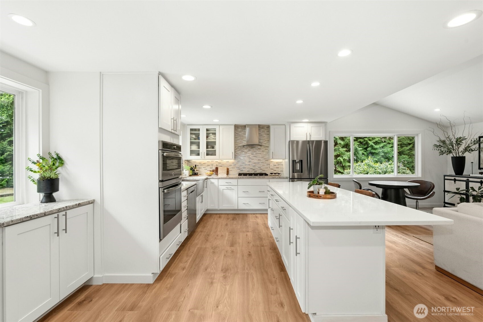 23307 49th Avenue Southeast Bothell, WA 98021 - Photo 10 of 37 a large white kitchen with a large window