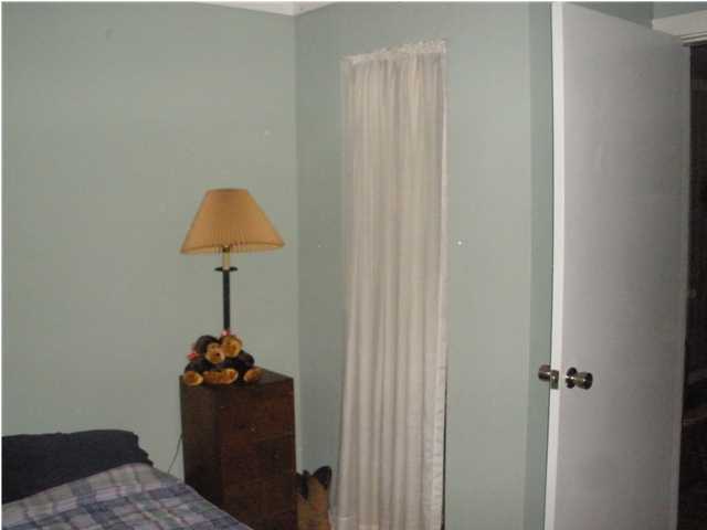 240 Wesley Road DeFuniak Springs, FL 32433 - Photo 12 of 25 a lamp on a table in a room