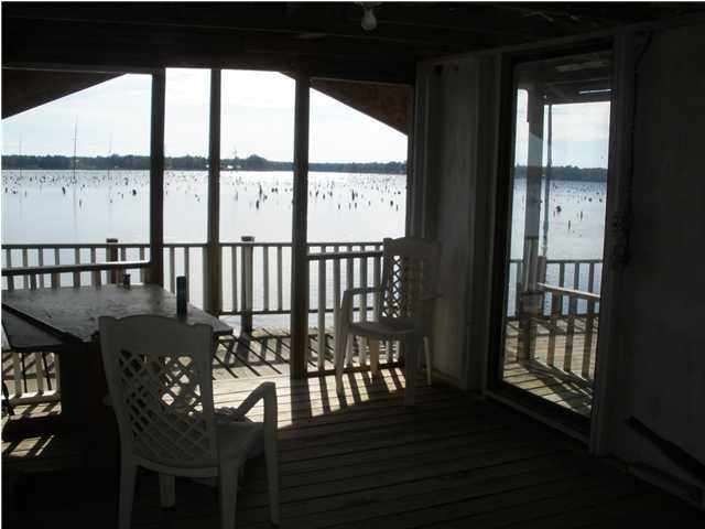 240 Wesley Road DeFuniak Springs, FL 32433 - Photo 23 of 25 a view of a balcony with furniture