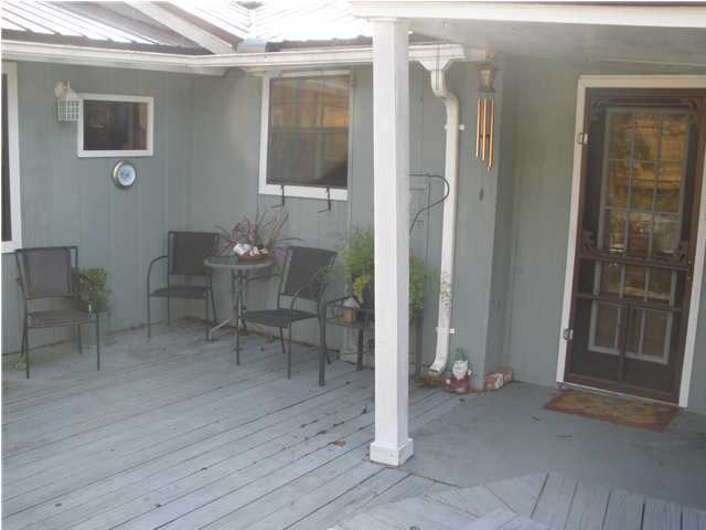 240 Wesley Road DeFuniak Springs, FL 32433 - Photo 3 of 25 a view of dining room with a table and chairs