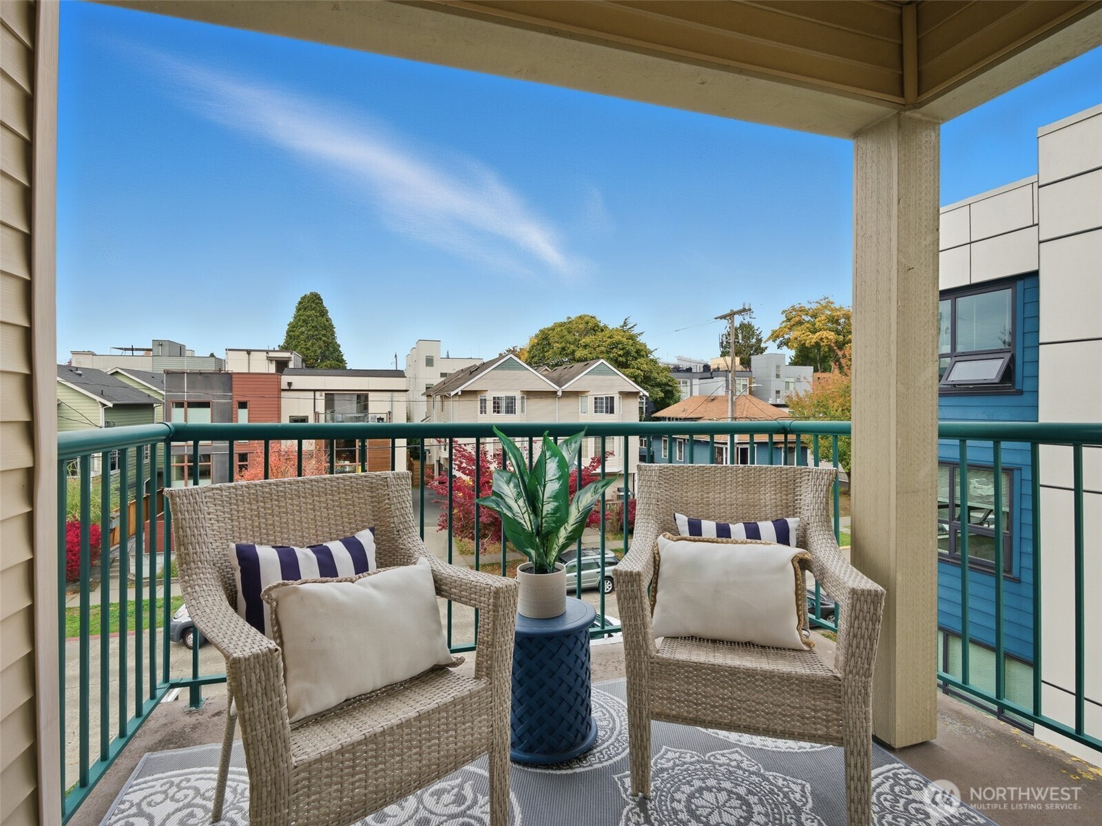1733 Northwest 59th Street, Unit 301 Seattle, WA 98107 - Photo 16 of 35 a view of a balcony with furniture