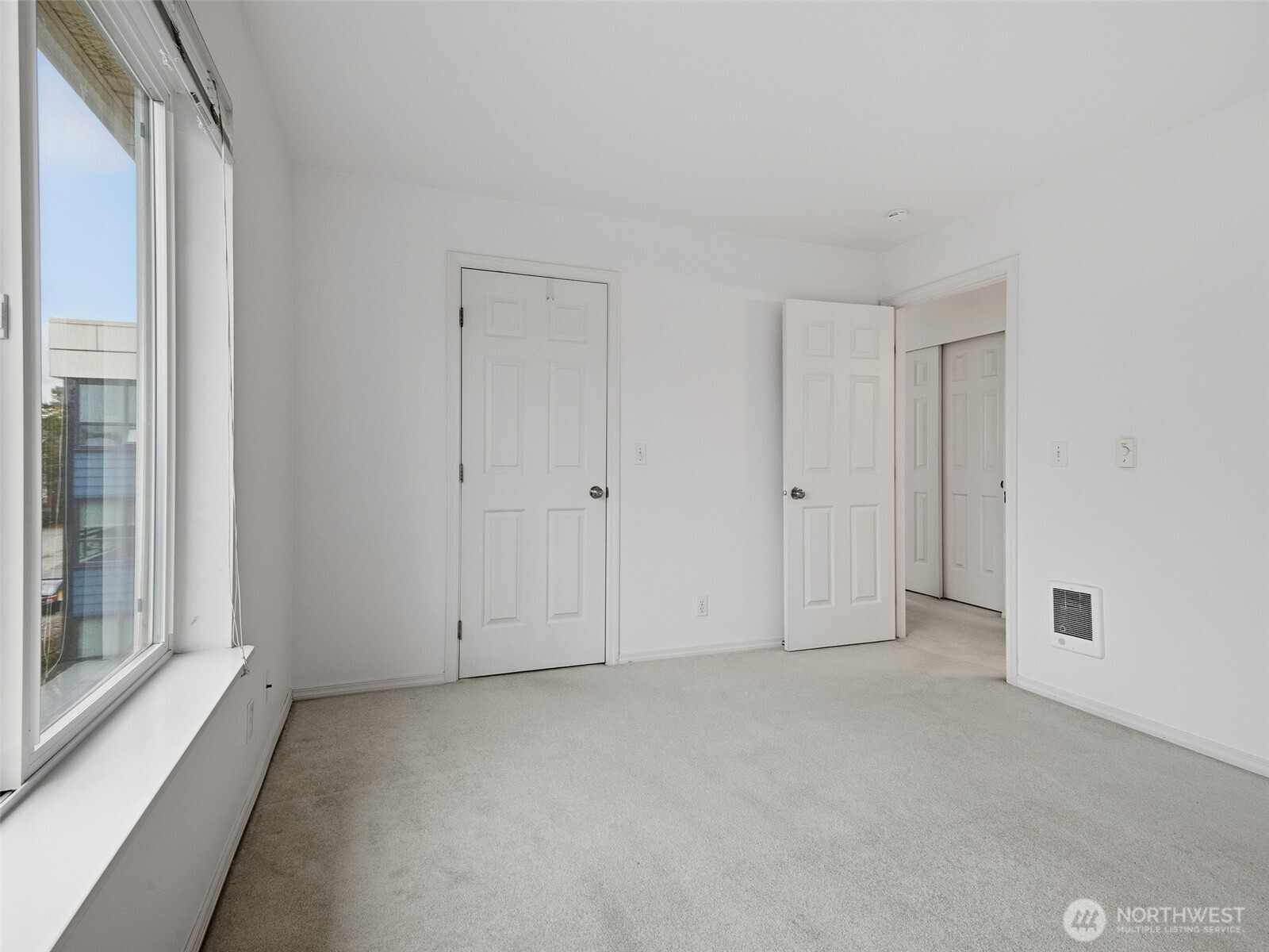1733 Northwest 59th Street, Unit 301 Seattle, WA 98107 - Photo 29 of 35 a view of room with window