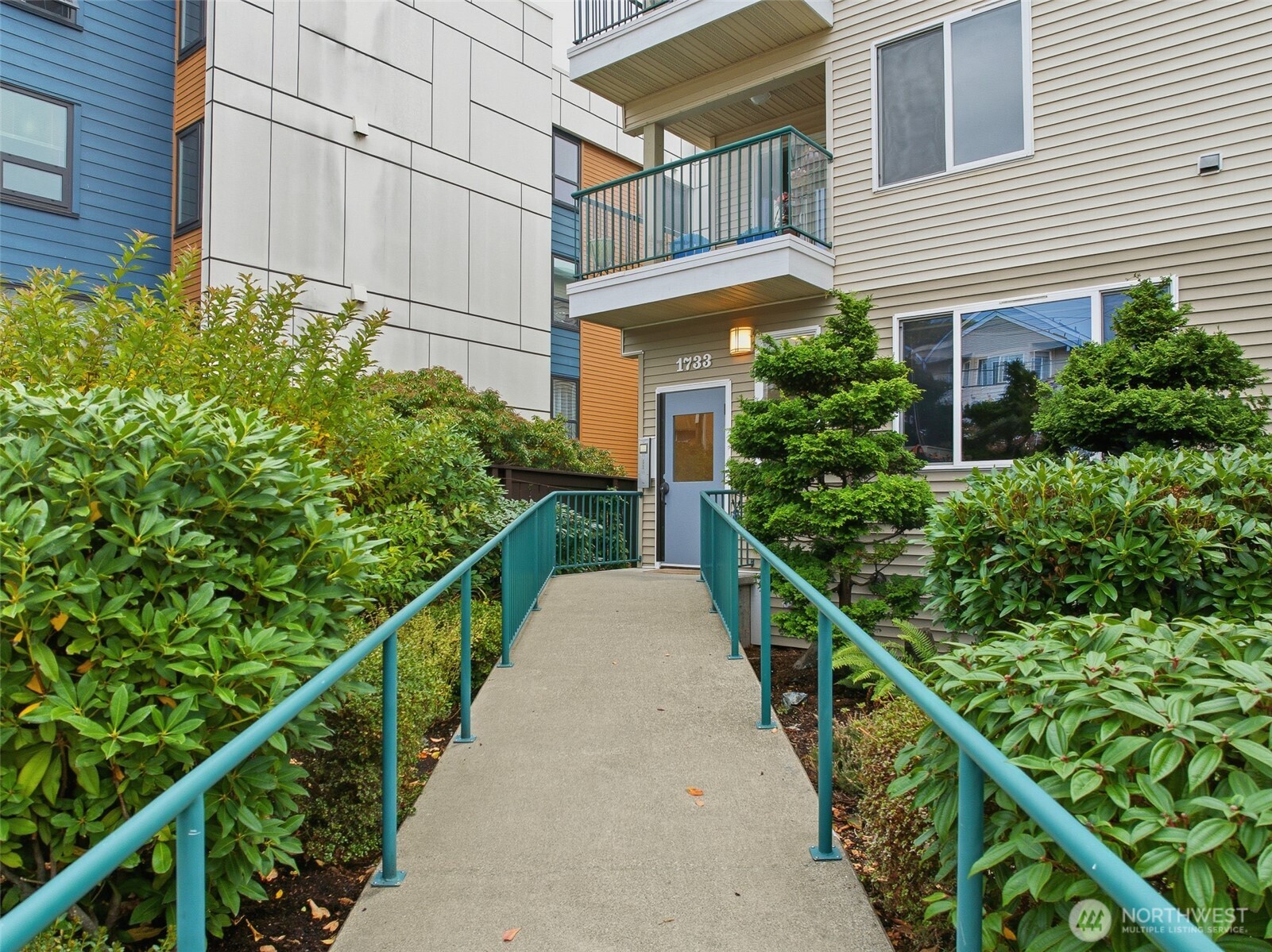 1733 Northwest 59th Street, Unit 301 Seattle, WA 98107 - Photo 3 of 35 a balcony view with an outdoor space