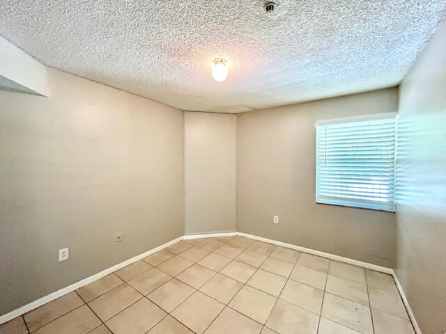 741 North Pine Island Road, Unit 303 Plantation, FL 33324 - Photo 12 of 32 a view of a room with a window and a ceiling fan
