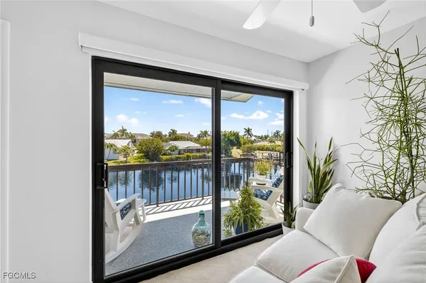 a view of balcony with furniture