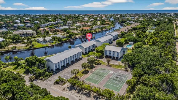 an aerial view of a house with a garden