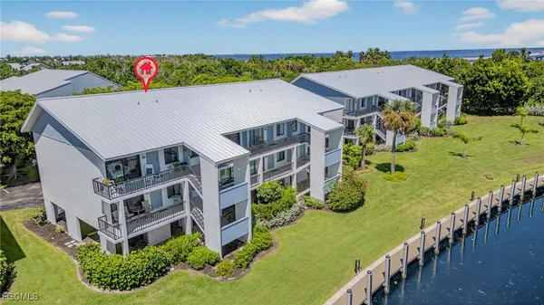 a view of a white building and outdoor space