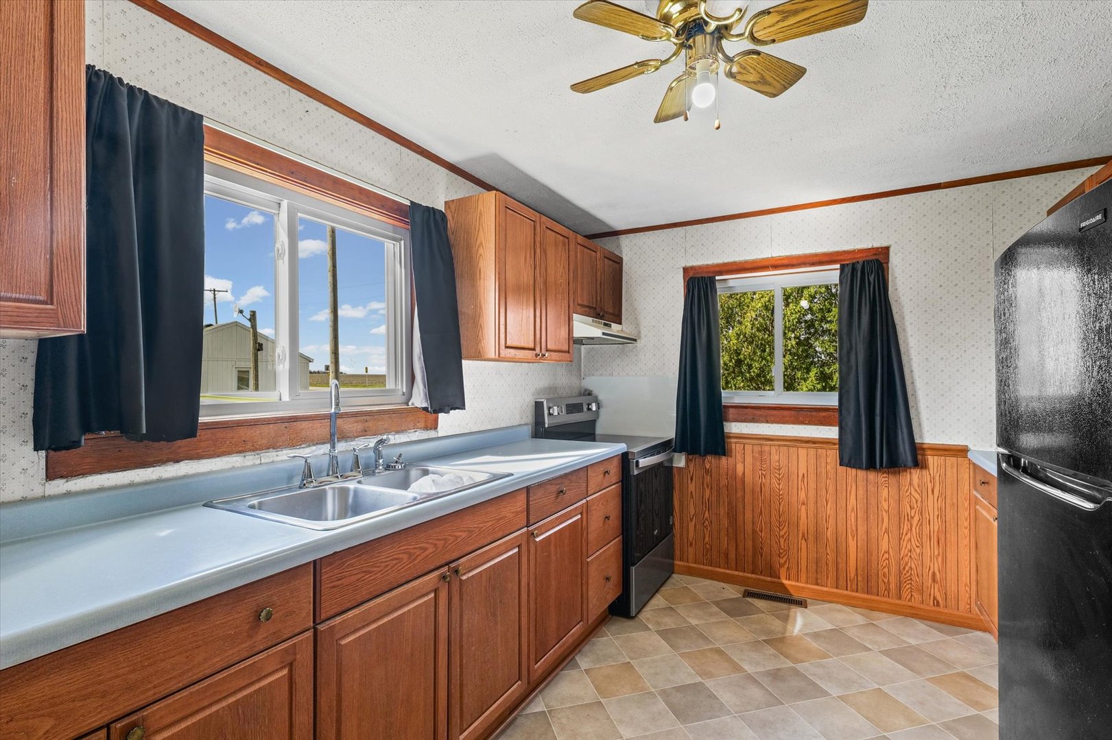 104 Allen Street Allerton, IL 61810 - Photo 11 of 33 a bathroom with a sink a vanity and a mirror