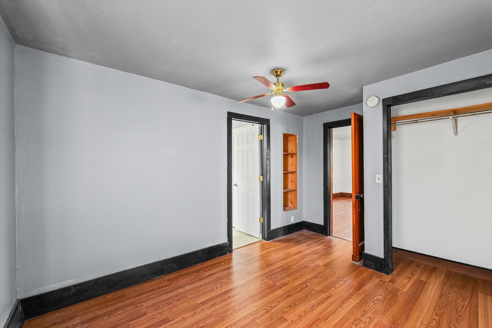 104 Allen Street Allerton, IL 61810 - Photo 17 of 33 wooden floor in an empty room with a window