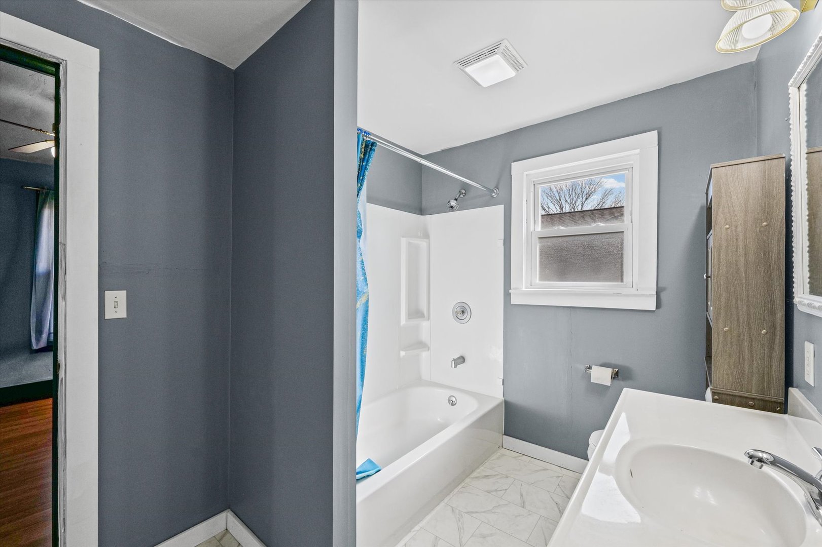 104 Allen Street Allerton, IL 61810 - Photo 19 of 33 a white bath tub sitting next to a white toilet