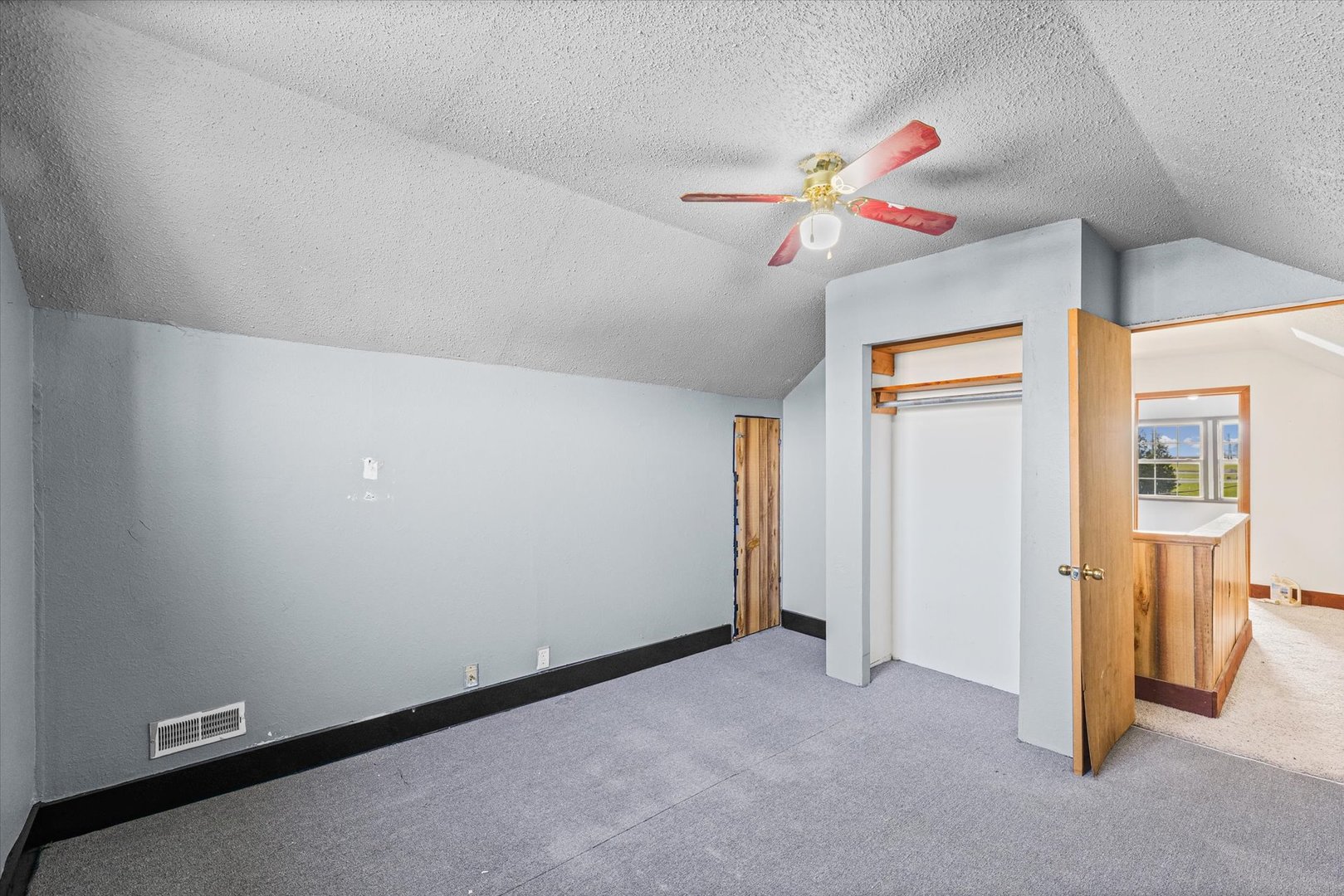 104 Allen Street Allerton, IL 61810 - Photo 26 of 33 a view of a livingroom with a ceiling fan and window