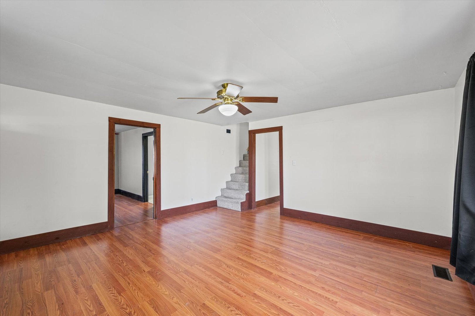 104 Allen Street Allerton, IL 61810 - Photo 7 of 33 a view of an empty room and wooden floor